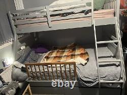 Double and single bunk bed with storage
